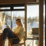 Woman reads a book on decision making