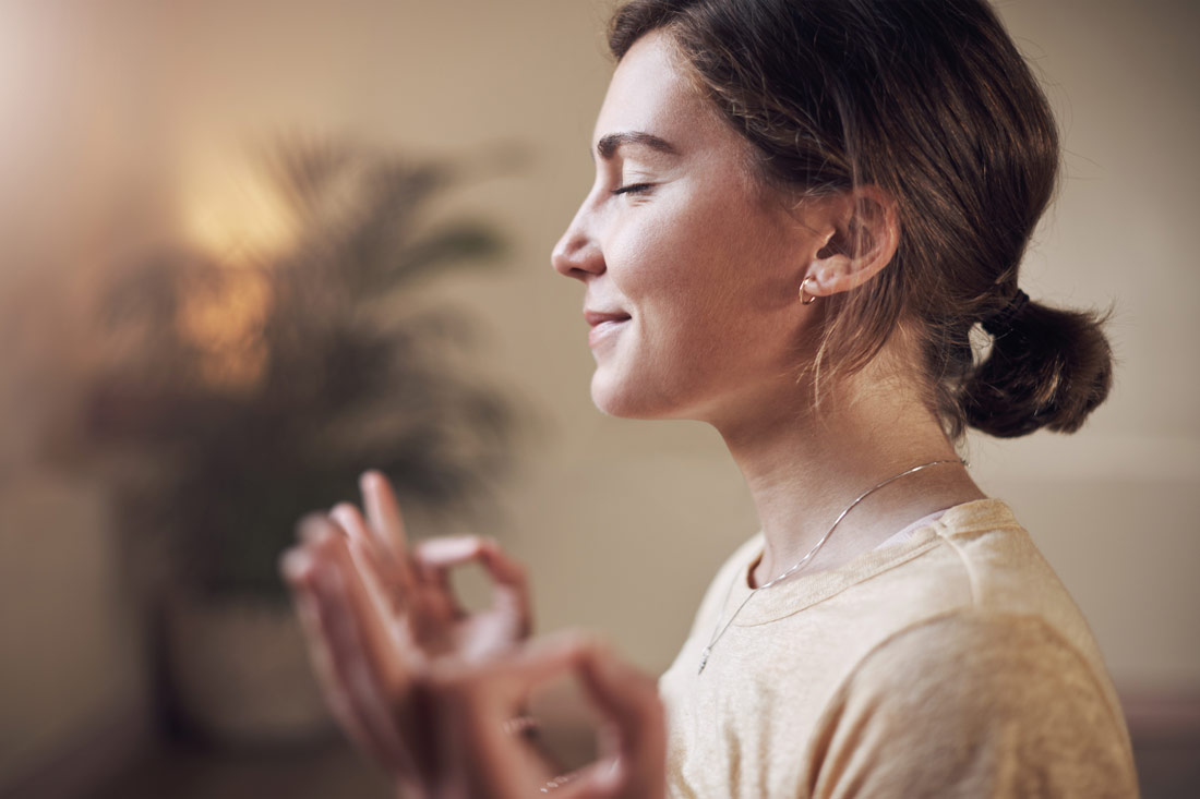 young women meditating and learning how to practice mindfulness