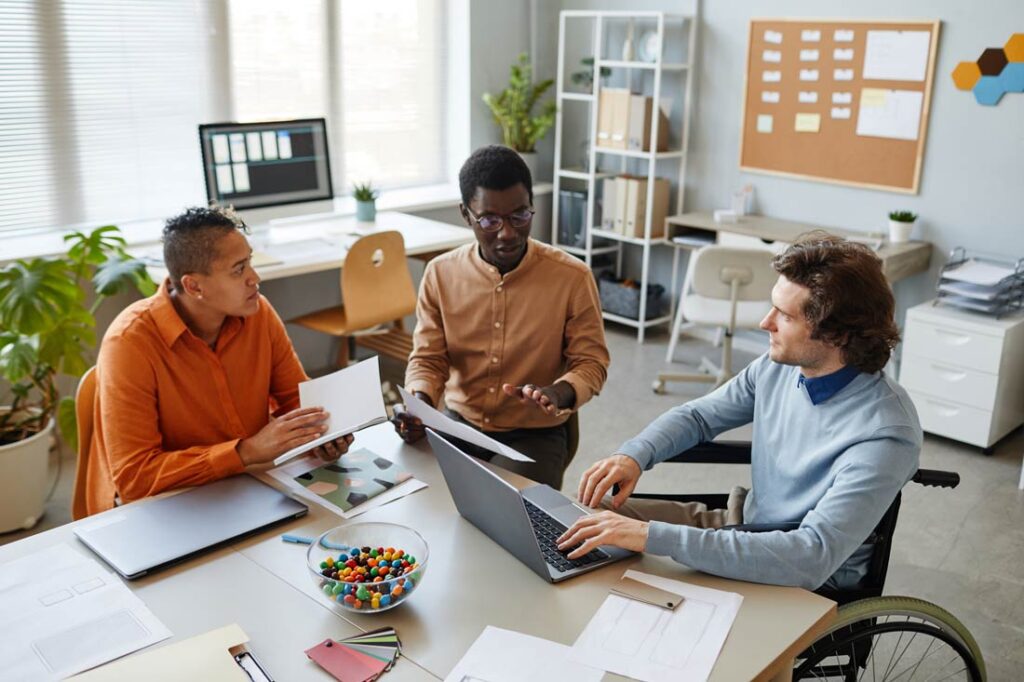 a group of people showing how to Support Entrepreneurs with Disabilities